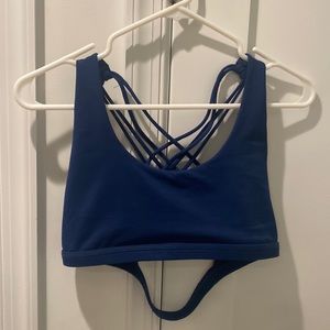 Worn once does not fit my shoulders but super cute back detailing!